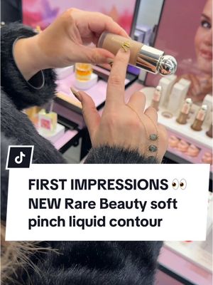 A post by @thelipsticklesbians on TikTok caption: FIRST IMPRESSIONS of the new @Rare Beauty Soft Pinch Liquid Contours in store @sephora 👀 This is the raw first time I’m ever trying them, and what really stuck out to me is the playtime. Need to give this a proper evaluation and put them to the test. Have y’all tried the Rare Beauty contours yet? Curious to hear your thoughts on this one! #makeup #rarebeauty #makeupreview #sephora #thelipsticklesbians 