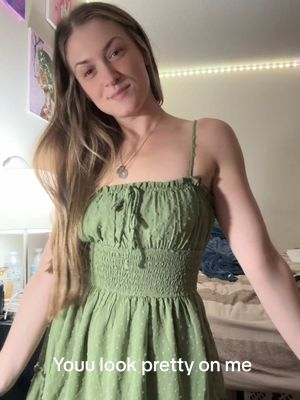 A post by @woaah.itschey on TikTok caption: Thoughts on this dress?💚💚💚#fyp #tryonhaul #shoppinghaul #dresses #helpme 