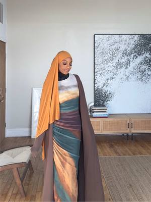 A post by @ansari.sumayah on TikTok caption: Fav dress right now 🤎 I can pair it with so many colors #fyp #foryou #maxidress 