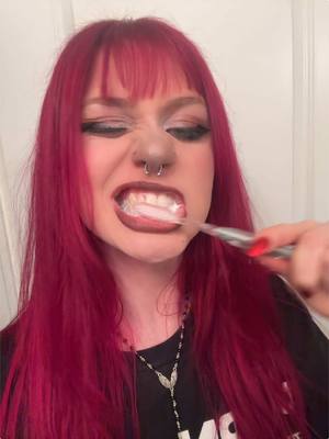 A post by @trashybagqueen on TikTok caption: POV brushing my teeth 💥