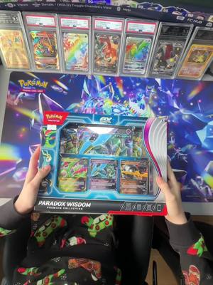 A post by @pokemonman2012_lucasl on TikTok caption: Let’s Open A Pokemon Paradox Wisdom Premium Collection Box !  #pokemon #pokemontiktok #pokemoncards #pokemontcg #pokemongo #pokemoncommunity #pov 