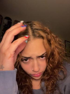 A post by @lilpapiclowngirl on TikTok caption: natural hair has entered the chat