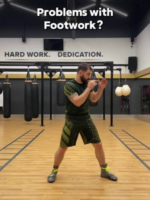 A post by @heavybagpro on TikTok caption: Having trouble with your boxing footwork? 🥊  Don't worry, we’ve got you covered! Improve your balance, speed, and coordination with these essential footwork tips. 👣✨   Want more drills to sharpen your skills? Get the Heavy Bag Pro app now and take your training to the next level! 📲💪   #BoxingTips #FootworkDrills #BoxingTraining #HeavyBagPro #BoxerLife #CombatSports #BoxingWorkout #StayInMotion 