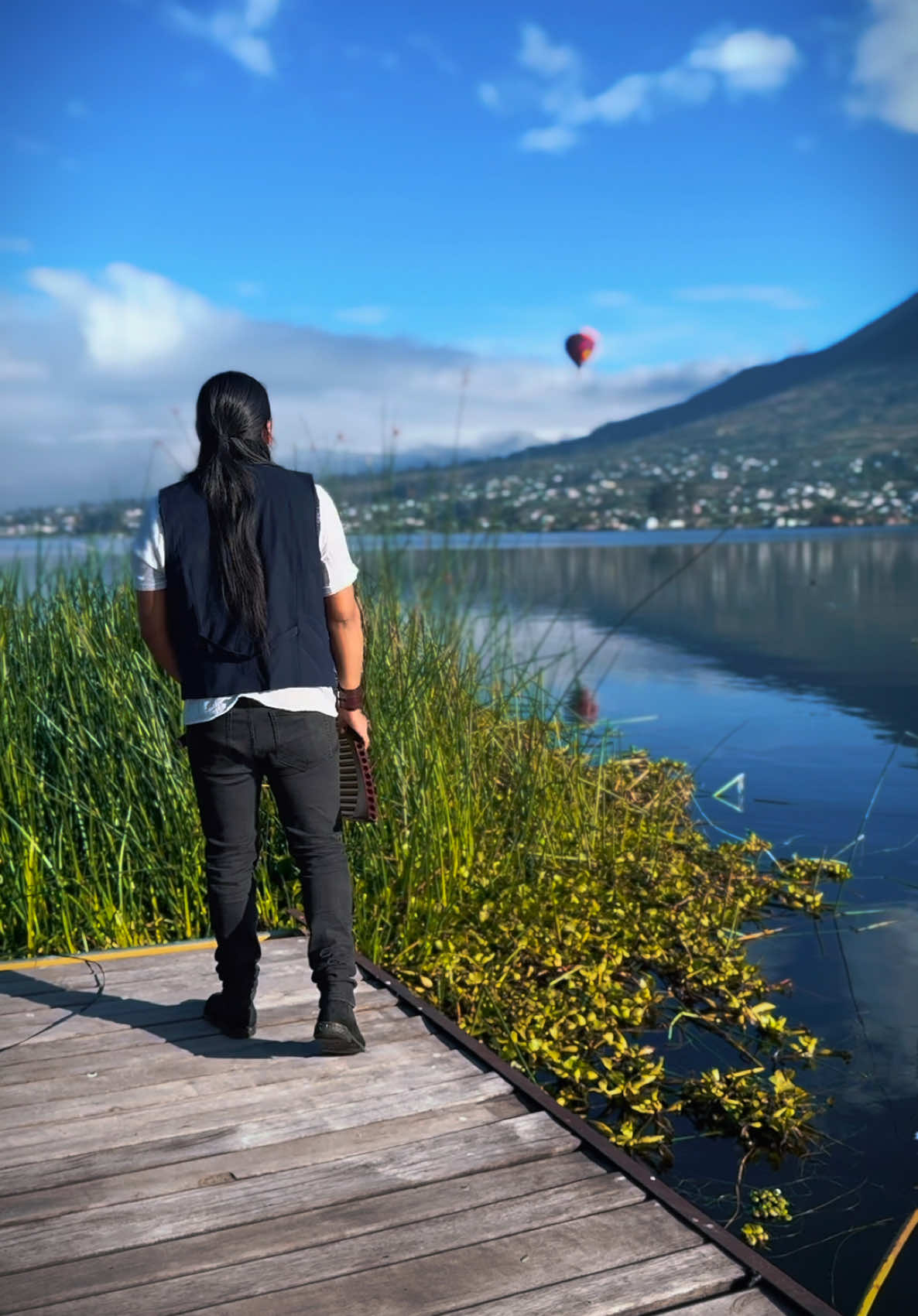 A post by @raimy_salazar_official on TikTok caption: Te He Prometido - Panflute #livemusic #relax #leodan #flute #otavalo #ecuador #nature #mountain #lake #soul 