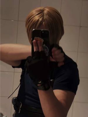 A post by @ryo._.thefrog on TikTok caption: Never to late for a trend 🙏 #leonkennedy #leonkennedycosplay #leoncosplay #leonkennedyresidentevil #leonkennedyre4 #residentevil #residentevil4 #residentevilcosplay #residentevilleonkennedy #re #re4 #cosplay #cosplayer 