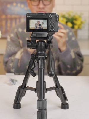 A post by @neewerofficial on TikTok caption: Beginner-friendly tripod - compact but fully functional! #neewer#tripod#MiniTripod #ContentCreation#PortableGear#Photography#VloggingTools #CompactTripod#iPhoneGear