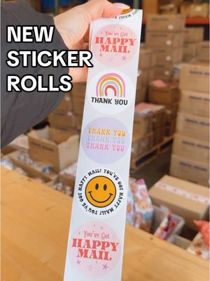 A post by @magicalmailers on TikTok caption: NEW STICKER ROLLS ⭐️⭐️⭐️⭐️⭐️ In stock and ready to ship! All sticker rolls include 500 2x2” waterproof stickers made up of 4 different designs! #shippingsupplies #polymailers #stickers #prettypackaging #packanorderwithme #smallbiztiktok #packagingorders #boutiqueowner 