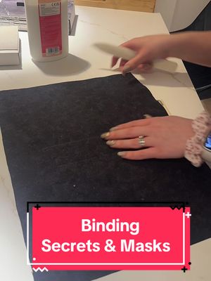 A post by @love_camille.x on TikTok caption: Binding Secrets & Masks by @Emerald_Slytherin - typeset by @JM Binding #bookbinding #BookTok #dramione #secretsandmasks 