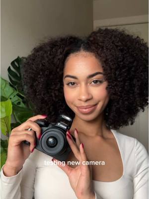 A post by @imanialexia_ on TikTok caption: 📸: canon eos r50  been eyeing this camera for a minute for my youtube vids. i love it! the pics also give digital cam 🤩  #canoneosr50 