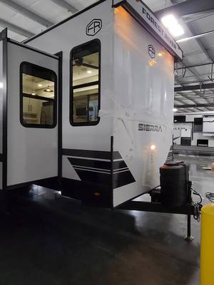 A post by @allaboutrvs on TikTok caption: 25 Sierra 388JW camper at Couchs RV Nation #rv #camping #travel #tinyhouse #rvlife #rvlifestyle #rvliving #glamper #glamping #tinyhome 