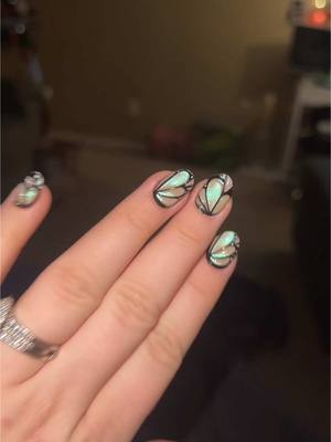 A post by @autumn.xxvi on TikTok caption: really grinds my gears #butterflynails #3Dnails #holographicnails #holographicbutterflies #nails #pressons #presson #fyp #foryou #foryoupage 