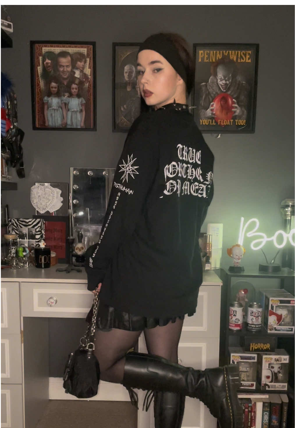 A post by @arianamageeginn on TikTok caption: Save for Band tshirt outfit inspo 🖤 using my fave bring me the horizon long sleeve 🩸🖤 I legit disassociated in one of these clips 😂 #alttiktok #alternative #altoutfits #bringmethehorizon #bmth #alt #gothicstyle #gothic #gothic 