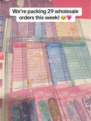 A post by @unicorn.eclipse on TikTok caption: This month has been wild!! We’re ending this month on a great note and packing lots of wholesale orders from the Faire market. Thank you so much for your support! 💖#cutestationery #stationery #packanorder #bookmarks #readinglogbookmark #notepads 