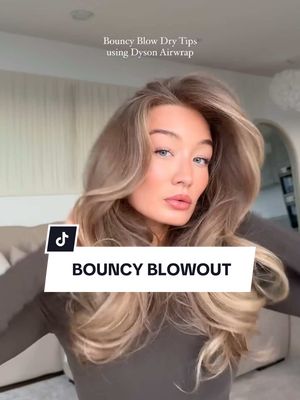 A post by @revolve on TikTok caption: How to achieve the perfect bouncy blowout using the @Dyson USA Airwrap with @bethansowerbyy 💁‍♀️🎀 See her tips and tricks below: - Use heat protector before drying - Leave hair slightly damp before airwrapping - Pin each curl and leave them in as long as possible. - Ensure the Dyson barrel curls away from your face. - Airwrap front pieces downward, then roll away from the face. - After unpinning, wait to brush; use a wide-tooth comb to maintain curls. - Lightly oil the ends if needed but avoid heavy oils to prevent drooping. - Apply @olaplex no.3 to mid-ends the night before for healthier results. #revolve #revolvebeauty #dysonhair #dyson #airwraptutorial #haircare #bouncyblowdry #dysonairwraptips #howtousedyson #athomeblowdry #blondehair #hair #hairstyle 