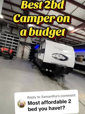 A post by @lakeshorervguy on TikTok caption: Replying to @Samantha This is the best 2 bedroom camper on a budget! This is the 2025 Grey Wolf 29QB #rv #camper #camping #travel #rvlife #van #vanlife #roadtrip 