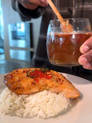 A post by @rappingchef on TikTok caption: Hot Honey Glazed Salmon! 🎤👨🏾‍🍳🎶  @Windows Bringing the farm to my table. Inspired by @upendoestatesfarm honey, I made this fire dish. Now @Elaine Lee is going to create some aesthetic dinner party honey-themed stationary #windowspartner #copilotpc #windowsfarmtotable