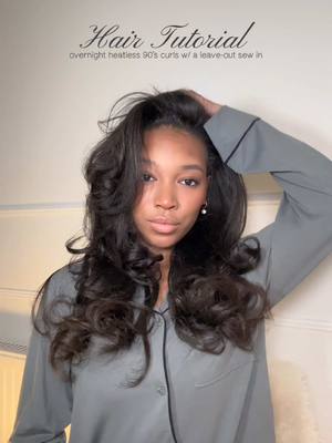 A post by @safiyarozi on TikTok caption: My official 90's heatless bouncy blowout curl tutorial speed up, ft. with a natural leave out sew in As a corporate babe this is such a morning time saver <3 #corporatebabe #sewin #leaveoutsewin #fyp #grwm #silkpress #heatlesscurls #itgirl #corporatebaddie #workhairstyles #blackgirlhairstyles 