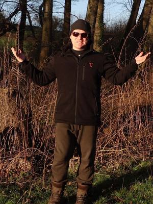 A post by @fox_international on TikTok caption: This is what makes this Jacket perfect for winter carp fishing! 🔥 Dean Watson runs through the features and benefits of the Sherpa Jacket, and why it's his go-to for the colder months 👌 The Sherpa Fleece Lined hooded Jacket features a heavy Sherpa Fleece lining for ultimate warmth with subtle black Fox logo print. Full length central zip with silicone dipped drawcords and ribbed Sleeve Cuffs Available in size S to 3XL, in Green or Black 😍