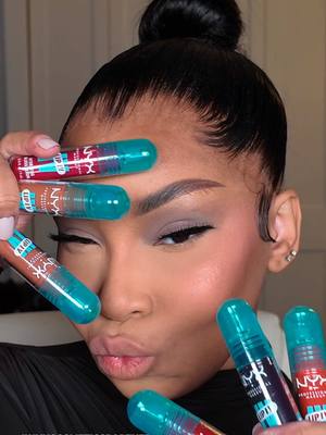 A post by @aaliyahjay on TikTok caption: Lips so hydrated they should come with a disclaimer  The NEW @NYX Professional Makeup Lip IV Gloss Stain has me OBSESSED—hydration, shine, and a stain that doesn’t quit? Yes, please. 👄 Drop a 💕 if you’re as into these glossy vibes as I am! #nyxcosmeticspartner 