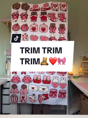 A post by @themustudiosco on TikTok caption: TRIM TRIMMING!!❤️🎀 ARE YOU READY FOR THE CUTEST MUG RUGS!!💕 #punchneedle #punchneedletiktok #mugrug #punchneedlemugrug #punchneedlecoaster #valentines #trimming #trimtrimtrim 