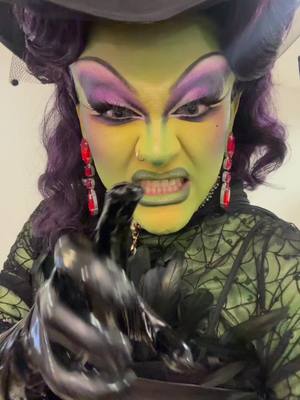 A post by @elliediamondofficial on TikTok caption: GIVE ME MY SHOES BITCH 👠🌈 #glindathegoodwitch #wickedwitchofthewest 