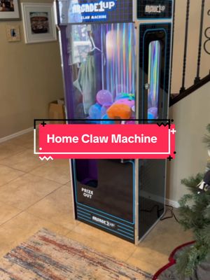 A post by @seanbryant on TikTok caption: My kids love going to the arcade to play claw machines. #arcade1up has released a new #clawmachine you can bring home and they absolutely love it. It’s very well made and easy to build. The kids like to put their old stuffed animals into it and charge their friends to try and win them. #familygamenight #familyfun #arcadeathome #gameroom 