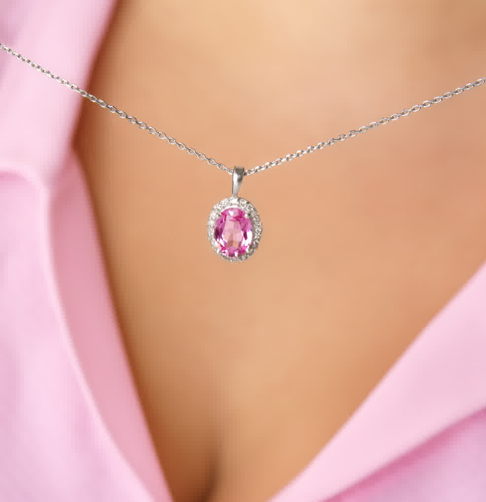 A post by @superjeweler on TikTok caption: This Pink Sapphire and Halo Diamond Necklace In Sterling Silver is now UNDER $100 with code "VAL25"👀💕 #superjeweler #pinksapphirenecklace #giftsunder100 #valentinesdayoutfitinspo