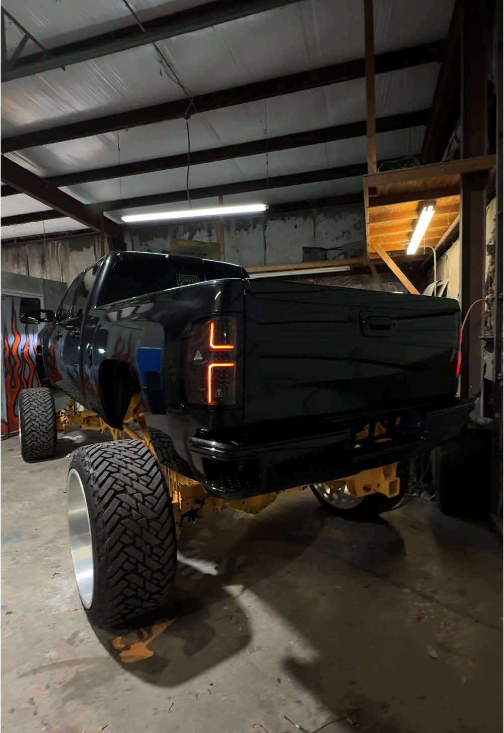A post by @jesselawless on TikTok caption: Getting close💪🏼🔥 #trucks #liftedtrucks #colormatch #trucksdaily #truckbuild