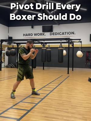 A post by @heavybagpro on TikTok caption: Improve your footwork and movement with this essential pivot drill! 🔄  Perfect for enhancing agility, balance, and defensive skills in the ring. Master your pivots and take your boxing to the next level! 🥊🔥   Train smarter with the Heavy Bag Pro app and sharpen your technique every session! 📲   #BoxingTraining # FootworkDrills #BoxingDrills #FightIQ #HeavyBagPro #BoxerLife #BoxingSkills #TrainLikeAPro 