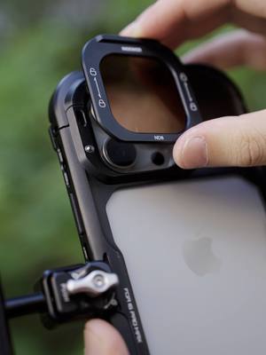 A post by @neewerofficial on TikTok caption: Paired with a NEEWER phone cage, these quick release filters are the easiest way to use filters with your iPhone 16 Pro/Pro Max! #neewer #iphone16promax #shotoniphone#filter#quickrelease #filmmaking