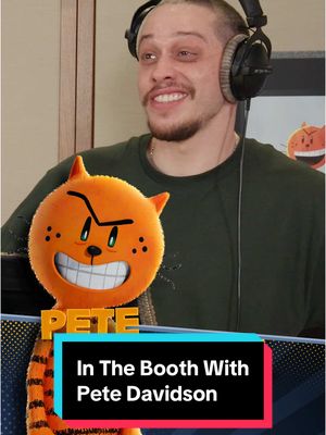 A post by @fandango on TikTok caption: Get an exclusive look inside the recording booth on #DogManMovie with Pete Davidson who voices Petey the Cat, and get your tickets on Fandango at the link in our bio - In theaters this Friday. #dogman #petedavidson #movietok #dreamworks #movie 