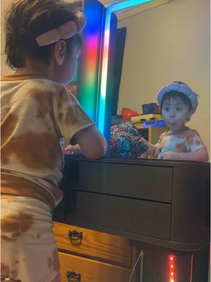 A post by @ameliamontgomery08 on TikTok caption: Had to come check out moms new project. 😅 such a good helper. Loving this new makeup vanity. ❤️ #campomelicdysplasia #inclusionmatters #cute #makeup #led 