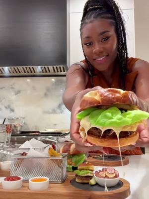 A post by @shenavici on TikTok caption: What I mean when I say I want a homemade burger 😋 #cooking #fromscratch #DinnerIdeas 