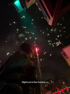 A post by @alexsey on TikTok caption: Adobe invited me to SF this week and my new friends and I stumbled across the chinese new years celebration happening in chinatown . It was perfect.  Things to do in san fransico #photographer 