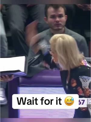 A post by @espnw on TikTok caption: #KimMulkey slapped the clipboard out of Seimone Augustus 👀 Coach Augustus’ reaction 😂 #lsu #coach #clipboard #react 