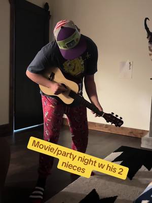 A post by @pinkertonboysadventures on TikTok caption: #funcle #fyp #pinkertonboysadventures #adoption #adoptfromfostercare #downsyndrome #makesomeonesmile #guitar #party #endtherword #makesomeonesmile #beagoodhuman #Love #wyoming 