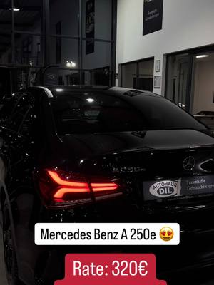 A post by @autohausdil on TikTok caption: 🚗 Mercedes-Benz A 250 e 8G-DCT AMG-Line + Night-Paket 🚗 💥 Entdeckt unser unschlagbares Angebot! 💥 ✅ Erstzulassung: 24.03.2022 ✅ Kilometerstand: 73.212 km ✅ Leistung: 160 PS (118 kW) ✅ Hubraum: 1.332 ccm ✅ Kraftstoff: Benzin ✅ Getriebe: Automatik ✅ Umweltplakette: Grüne Plakette ✅ TÜV/AU: Neu oder mindestens 18 Monate 🎯 Sonderausstattung: ✔️ 14U Smartphone-Integrationspaket ✔️ 218 Rückfahrkamera ✔️ 243 Aktiver Spurhalte-Assistent (Kamera) ✔️ 258 Kollisionswarner mit aktivem Bremseingriff (FCW-Stop) ✔️ 287 Durchlademöglichkeit ✔️ 294 Kneebag ✔️ 310 Doppelcupholder ✔️ 345 Regensensor ✔️ 351 Ecall-Notrufsystem ✔️ 413 Panorama-Schiebedach ✔️ 440 Tempomat 💰 Preis: 28.650,00 € (USt. ausweisbar) 🔹 1 Jahr Garantie kostenfrei – 1 Jahr Gewährleistung 🚗 Finanzierung auch ohne Anzahlung möglich! 📌 Gebrauchtfahrzeug-Inzahlungnahme möglich! 📍 Interesse geweckt? Vereinbart jetzt euren Termin über den Link in unserer Bio oder schreibt uns direkt! 🏁 #MercedesBenz #A250e #AMGLine #NightPaket #Gebrauchtwagen #CarFinance #AutohausDIL #MercedesLover #Finanzierung #Traumauto #autokaufen 