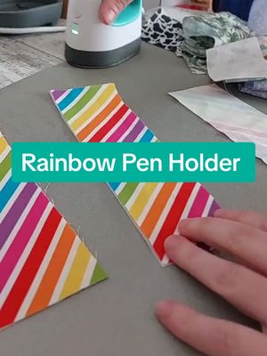 A post by @juniperjanecraft on TikTok caption: 🌈  I love this vibrant rainbow fabric. 🌈 In this video I have used it to sew a handy Lanyard Pen Holder. These are available to purchase in my shop in a range of different fabrics. They can clip onto your lanyard and hold 2 pens so you always have one handy. #janomesewingmachine #sewing #sewingfun #sewingproject #sewinglove #lanyardaccessory #sewingmachine #fabricpenholder #sewinglife #lanyardpen #penholder #sewnbyme #lanyardpenholder #makingprocess #teacherlanyard #penpouch #teacheraccessory #teachergift #sewingbusiness #onthisday 