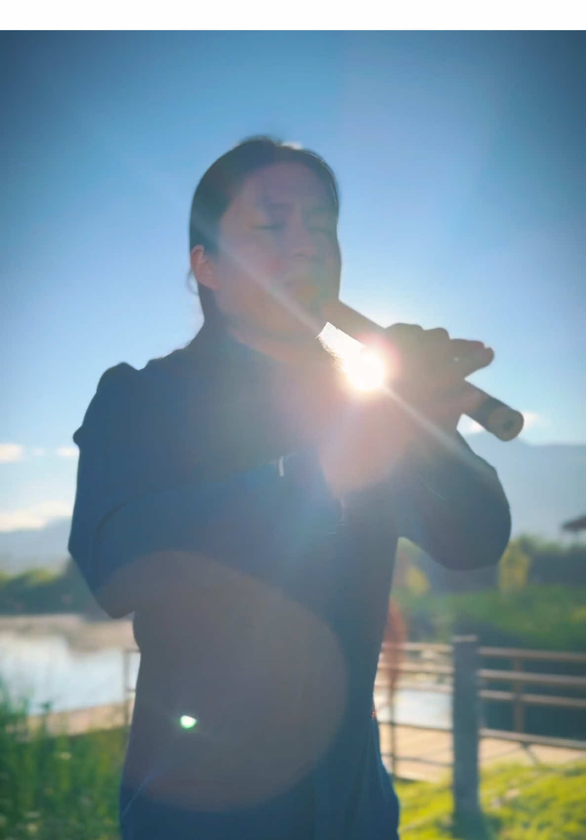 A post by @raimy_salazar_official on TikTok caption: Ñaupa Llacta - Quena Flute #LiveMusic #otavalo #sanjuanito #dance #traditional #imbabura #mountain #lake #sunset 