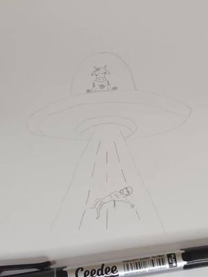 A post by @shortsmotivation85 on TikTok caption: Cow Riding UFO 🤣👽 #sleeping #cow #ufo #ufoキャッチャー #alien 