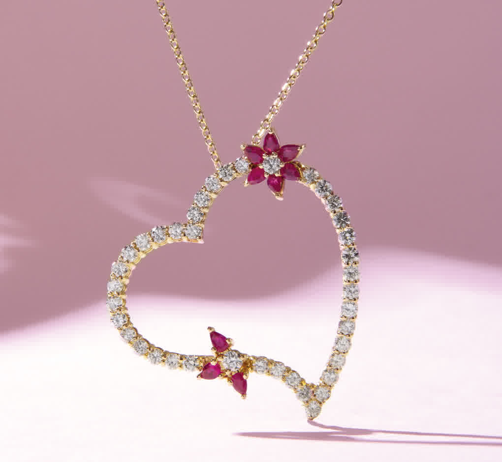 A post by @superjeweler on TikTok caption: #superjeweler #rubyjewelry #diamondheartnecklace #valentinesdaygift