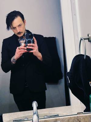 A post by @tylorgrey on TikTok caption: You’re gunna be the one that saves me. My mirror is spotty. sleeptoken #tylorgrey 