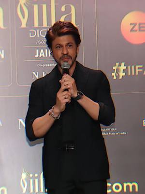 A post by @srk.khan19 on TikTok caption: Shahrukh Khan at the IFFA press conference 2025 #srk #sahrukhkhan #shahrukhan #shahrukhkhan #kingofbollywood #iamsrk #srkian #srkfan #srkfanclub #fyp 