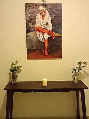 A post by @gk_official_malaysia on TikTok caption: Shirdi Sai Baba Canvsa Poster with Frame 60x90cm. Can Google Picture and send to us. +60104202926 link in Bio