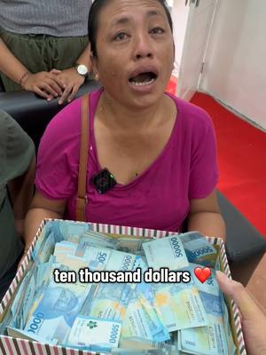A post by @isaiahgarza on TikTok caption: POV: This video will probably make YOU cry! 🥹💔 NiLuh’s husband passed away & the family was left homeless. So we surprised Niluh & her kids with a house, car & her dream laundry business ❤️ #family #beautiful #Love 