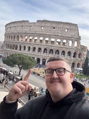 A post by @marshallexler on TikTok caption: This surely has to be the best view of the colosseum in Rome 😍 #bigpapi #travel #fayeandmarshall #fyp 