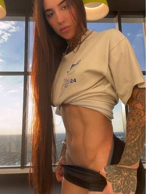 A post by @bakharnabiieva on TikTok caption: #abs #longhairdontcare 