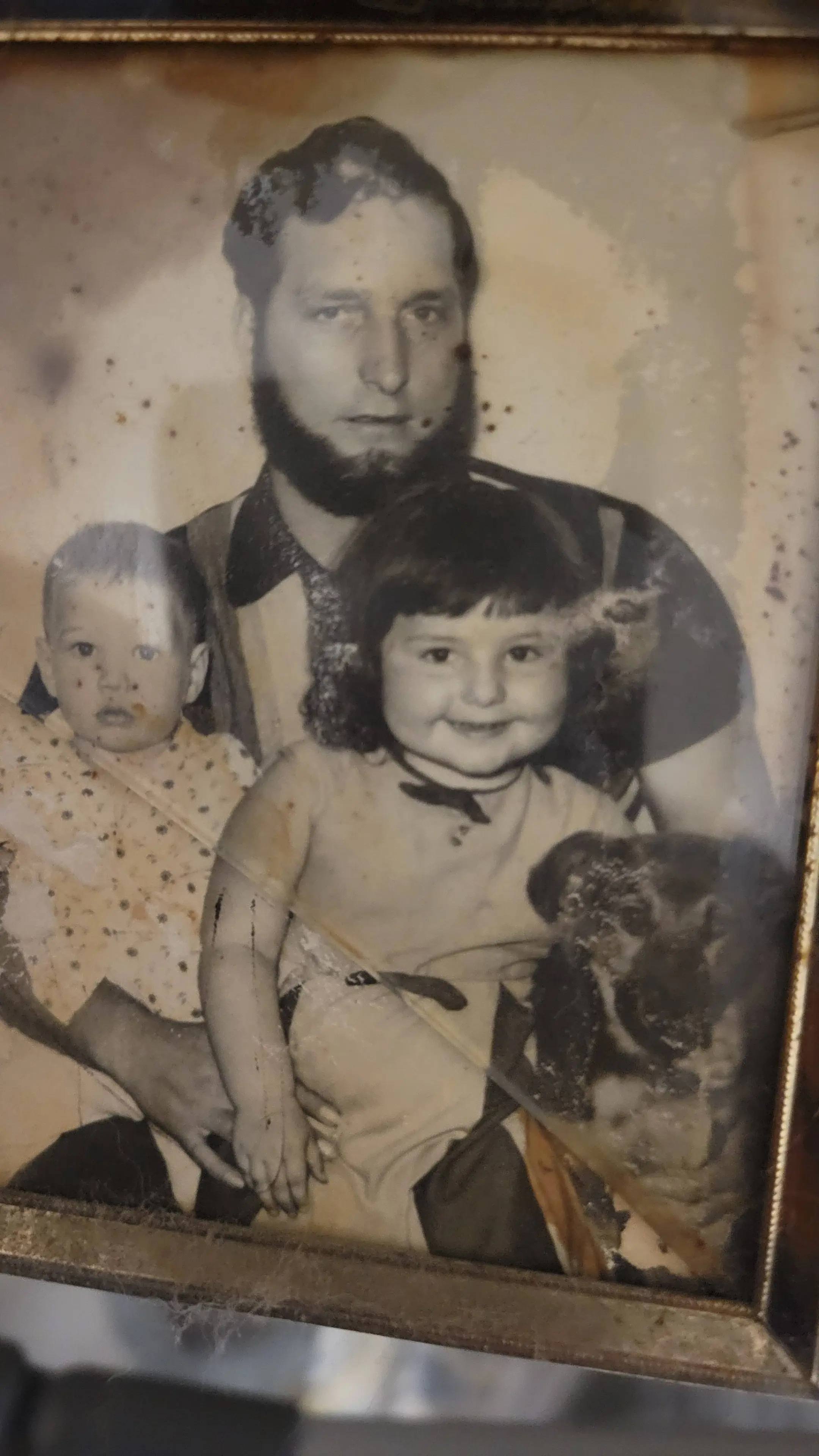 A post by @diannasharp25 on TikTok caption: Daddy, Bobby, me and Hobo.