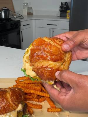 A post by @daronthechef on TikTok caption: Croissant Turkey Burgers  😩🔥 1 Pound of Ground Turkey  1 Egg  1 Half Cup of Panko Breadcrumbs  About 2 Tablespoons of Fresh Parsley  1 Small Onion - Diced  3 Stalks of Green Onion Season to TASTE.  Sauce:  Mayo  Honey Barbecue Sauce  Mustard  Ketchup  Onions  #Foodie #burgersandfries 