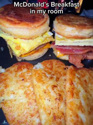 A post by @lazypotnoodle on TikTok caption: Making McDonald’s breakfast McGriddles in my room! 🥓🍳🥞 – One of my all-time favorite breakfasts, made simple at home! Ingredients 👇  * Thick cut bacon * Sausage Pattie’s * Pancake mix * Maple Syrup * Eggs * Salt * Whole milk * Butter * Melted butter * Hash-brown Pattie’s * American cheese * Coffee * Sugar #lazypotnoodle #foodtiktok #FoodTok  #Foodie #foodies #breakfast #breakfastfood #breakfastecipe #lazypot #EasyRecipe #easyrecipies #mcdonalds #mcgriddle  #homemademcdonalds #comfortfood #bacon #eggs 